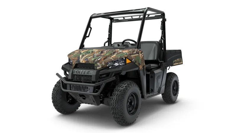 Electric utility task vehicle on a work site