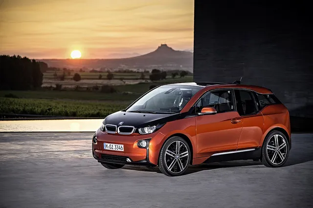 Sunset view and orange i3 BMW electric car